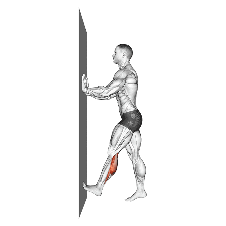 calf push stretch with hands against wall
